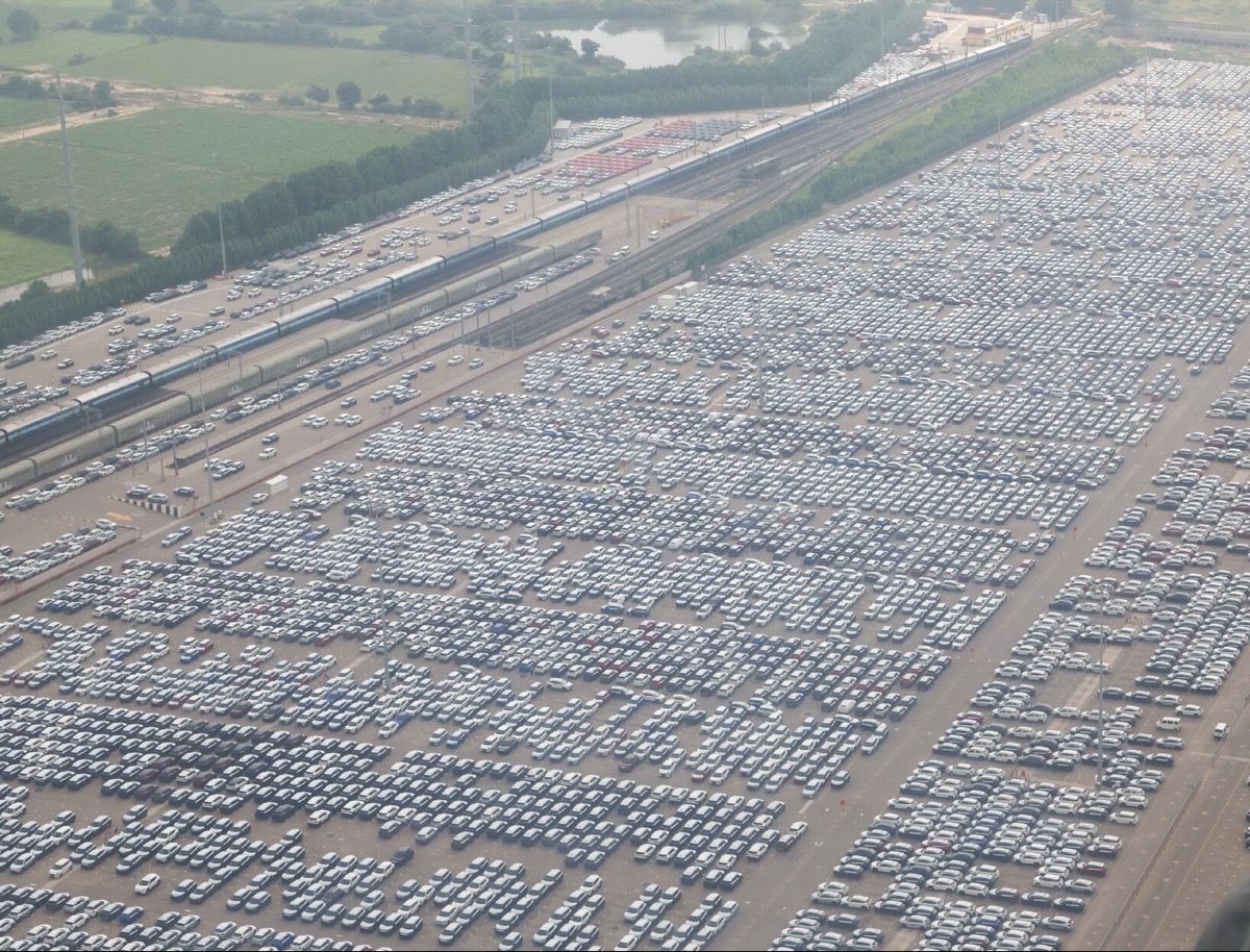 Aerial view of thousands of new cars in the Maruti Suzuki plant yard at Hansalpur